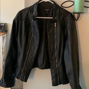 Black “leather” jacket.